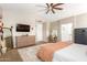 The expansive main bedroom boasts carpet flooring, natural light and plenty of space for relaxation and personalization at 9624 E Thunderbolt Ave, Mesa, AZ 85212