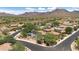 Lovely desert neighborhood with mountain views featuring tile roof homes and mature trees at 9904 E South Bend Dr, Scottsdale, AZ 85255