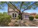 Beautiful two-story home with a tile roof and well-maintained front yard landscaping at 9904 E South Bend Dr, Scottsdale, AZ 85255