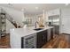 Spacious kitchen with white countertops, a large island, and stainless steel appliances at 9904 E South Bend Dr, Scottsdale, AZ 85255