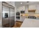 Gourmet kitchen featuring stainless steel appliances, double ovens, and a bright countertop at 9904 E South Bend Dr, Scottsdale, AZ 85255