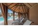 Relaxing poolside lounge area with shaded cabanas and comfortable chaise lounges at 9904 E South Bend Dr, Scottsdale, AZ 85255