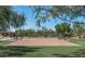 Sand volleyball court with net in place, located in a well-maintained community park at 9904 E South Bend Dr, Scottsdale, AZ 85255