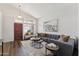 Bright living room with hardwood floors, high ceilings, and stylish modern furniture at 1029 E Jasper Dr, Gilbert, AZ 85296