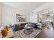 Modern living area with hardwood floors, neutral colors, and an open floor plan at 1029 E Jasper Dr, Gilbert, AZ 85296