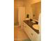 Well-maintained bathroom features a vanity, mirror, and shower at 1100 S 176Th Ave, Goodyear, AZ 85338