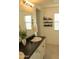 Bathroom with single vanity, neutral colors and natural light at 1100 S 176Th Ave, Goodyear, AZ 85338