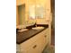 Bathroom featuring modern fixtures, a vanity with granite counters, and a well-lit mirror at 1100 S 176Th Ave, Goodyear, AZ 85338