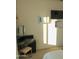 Bedroom with a vanity area, natural light, and neutral wall decor at 1100 S 176Th Ave, Goodyear, AZ 85338
