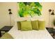 Bedroom with a comfortable bed, bedside lamps, and stylish wall art at 1100 S 176Th Ave, Goodyear, AZ 85338