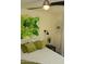 Bedroom featuring soft lighting, a ceiling fan, and decorative wall art at 1100 S 176Th Ave, Goodyear, AZ 85338
