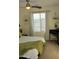Bedroom featuring a vanity, bright window, and minimalist decor at 1100 S 176Th Ave, Goodyear, AZ 85338