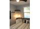 Comfortable bedroom featuring stylish decor, a window with blinds, and neutral wall color at 1100 S 176Th Ave, Goodyear, AZ 85338