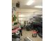Spacious garage featuring ample storage and parking with a car at 1100 S 176Th Ave, Goodyear, AZ 85338