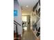 Hallway with modern geometric wall design, connecting living spaces with style and contemporary aesthetic at 1100 S 176Th Ave, Goodyear, AZ 85338