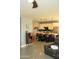 Open-concept kitchen features a stylish island with seating and pendant lighting, perfect for casual dining and entertaining at 1100 S 176Th Ave, Goodyear, AZ 85338