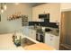 Kitchen with stainless steel appliances, granite countertops and ample cabinet space at 1100 S 176Th Ave, Goodyear, AZ 85338