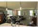 Open living space featuring a black leather sofa, custom art and recessed lighting at 1100 S 176Th Ave, Goodyear, AZ 85338