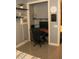 Efficient home office space with a built-in desk, shelving, and modern equipment at 1100 S 176Th Ave, Goodyear, AZ 85338