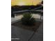 Outdoor space featuring a luxurious pool and desert landscaping elements at sunset at 1100 S 176Th Ave, Goodyear, AZ 85338
