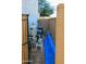 Pool equipment with filter and pump, nestled along the side of the house at 1100 S 176Th Ave, Goodyear, AZ 85338