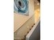 Carpeted staircase with white railing and wall art at 1100 S 176Th Ave, Goodyear, AZ 85338