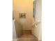 Carpeted staircase with neutral walls and decorative artwork at 1100 S 176Th Ave, Goodyear, AZ 85338
