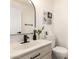 Updated powder room featuring new fixtures, and modern decor at 1202 E Libby St, Phoenix, AZ 85022