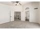 Carpeted main bedroom with access to upstairs hallway at 1202 E Libby St, Phoenix, AZ 85022