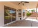 Covered patio with ceiling fan and access to the backyard at 1202 E Libby St, Phoenix, AZ 85022