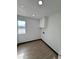 Bright and spacious room with laminate flooring, window, and neutral paint. Perfect for an office or storage at 1214 E Henry St, Tempe, AZ 85288