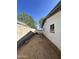 Side yard featuring block wall fence provides a perfect space for gardening or additional storage space at 1214 E Henry St, Tempe, AZ 85288