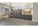 Garage area boasts custom storage cabinets, organizers, and ample workspace at 13072 W Alyssa Ln, Peoria, AZ 85383