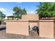 View of the pool equipment enclosure with a screen for privacy with desert landscaping in the background at 13072 W Alyssa Ln, Peoria, AZ 85383