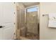 Bathroom features a glass enclosed shower with built in bench at 13072 W Alyssa Ln, Peoria, AZ 85383