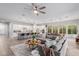 Open-concept living room and kitchen creating an inviting space for entertaining and everyday living at 14360 W Windrose Dr, Surprise, AZ 85379