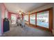 Bright dining area with patio access, showcasing a modern table set and elegant decor for entertaining at 14412 N 39Th Ave, Phoenix, AZ 85053