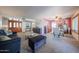 Inviting living room featuring neutral tones, seamlessly connects to the dining area, enhancing the open feel at 14412 N 39Th Ave, Phoenix, AZ 85053