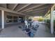 Covered outdoor patio with concrete floor and seating area with large patio table and outdoor accents at 14412 N 39Th Ave, Phoenix, AZ 85053