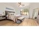 Comfortable bedroom with large bed, neutral tones, and natural light from a window at 16609 N 40Th Dr, Phoenix, AZ 85053