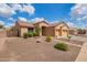 Beautiful home with a well-maintained yard, desert landscaping, and an inviting front entrance at 16609 N 40Th Dr, Phoenix, AZ 85053