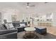 Bright living area seamlessly connected to the kitchen with stylish furniture and decor at 16609 N 40Th Dr, Phoenix, AZ 85053