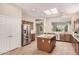 Well-equipped kitchen with stainless steel appliances, a center island, and ample counter space at 16704 W Oracle Rim Dr, Surprise, AZ 85387