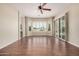 Bright main bedroom with walk-in closet, ceiling fan, and a bay window at 16704 W Oracle Rim Dr, Surprise, AZ 85387