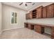 Home office with custom built-in desk and cabinets, plus a view at 16704 W Oracle Rim Dr, Surprise, AZ 85387