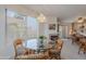 Bright dining area with sliding doors to outdoor patio and views of community at 16715 E El Lago Blvd # 212, Fountain Hills, AZ 85268