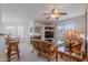 Bright living room featuring a fireplace, built-in shelves, and sliding glass doors at 16715 E El Lago Blvd # 212, Fountain Hills, AZ 85268