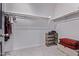 Spacious walk-in closet with rod shelving, perfect for organization and storage with room for suitcases at 1914 N Marketside Ave, Buckeye, AZ 85396