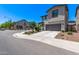 Home exterior on a corner lot featuring a landscaped yard and neutral siding paint at 1914 N Marketside Ave, Buckeye, AZ 85396