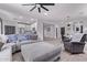 Spacious living area with open floor plan connecting to a modern kitchen at 1914 N Marketside Ave, Buckeye, AZ 85396